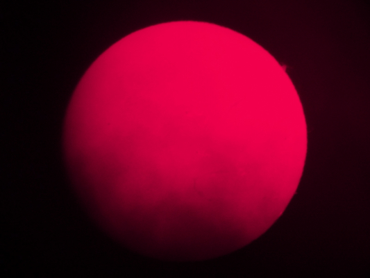 The sun’s disc, with a little cloud, as seen through the solar telescope. December 11th 2014.