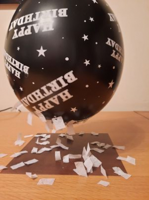 Balloon pick up paper